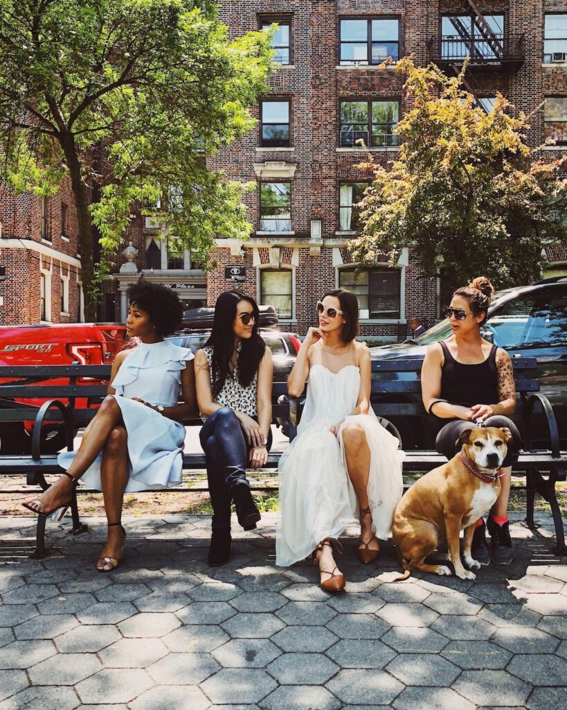 women on bench