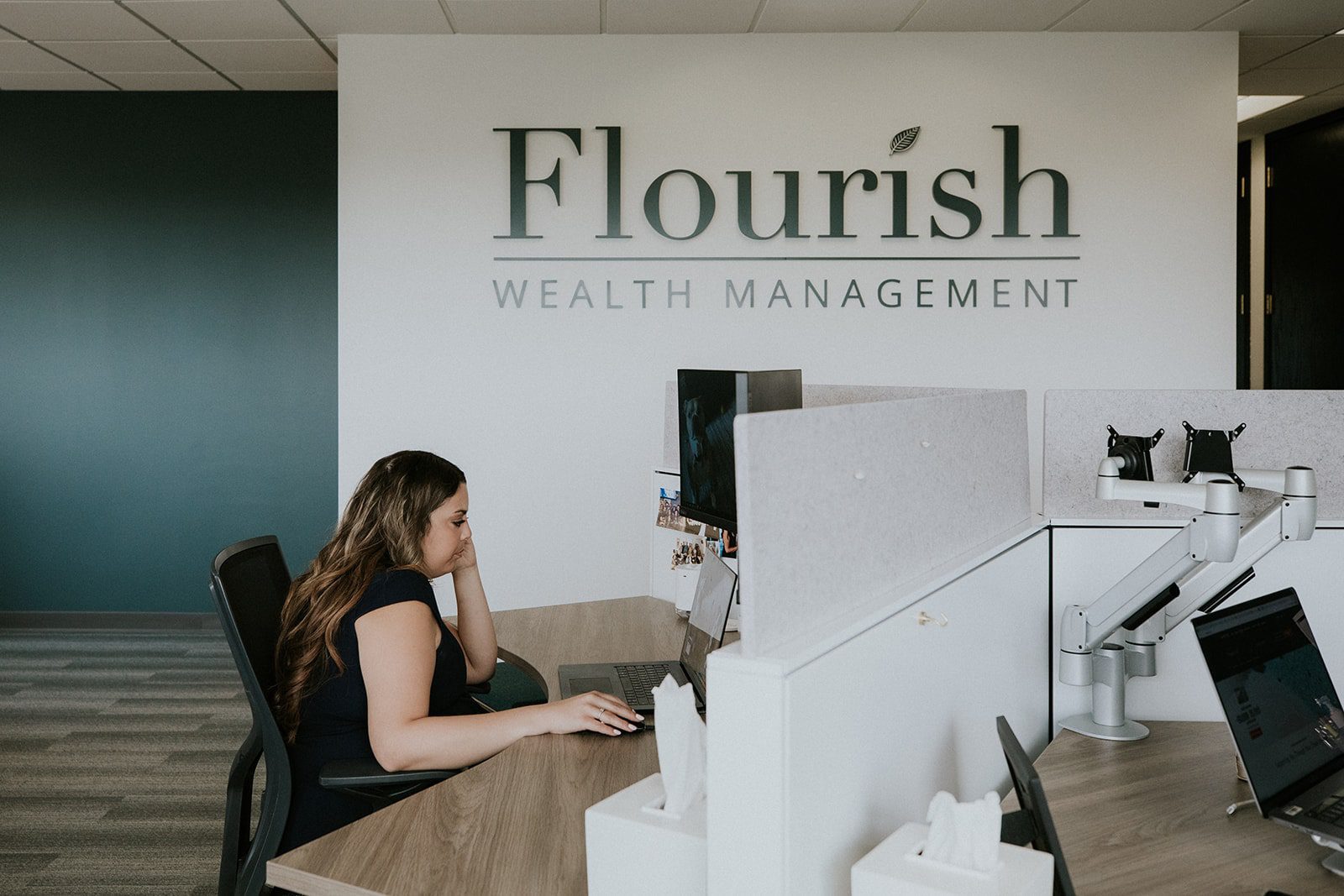 Flourish Wealth Management Miranda Libra Working at Desk